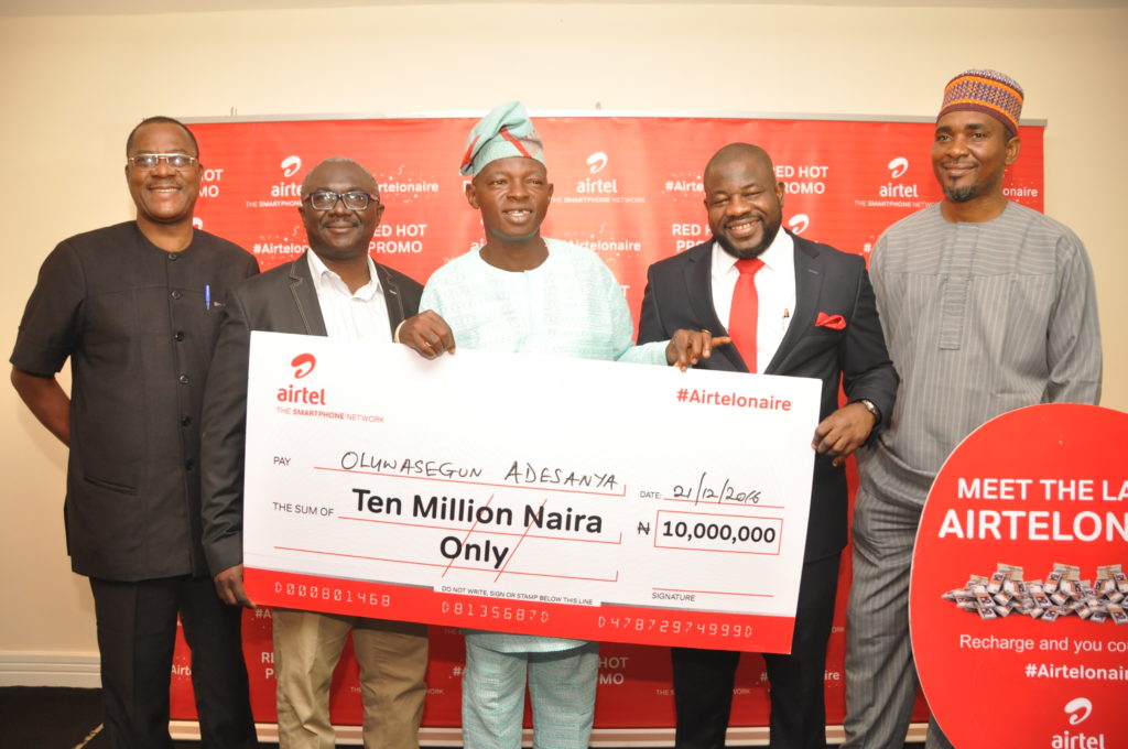 Head, Consumer Protection Council, Lagos Zone, Joshua Ngada; General Manager, Mass Market Segment, DipoJolaosho; N10million cash prize winner, OluwasegunAdesanya; Regional Operations Director, Lagos Region, Airtel Nigeria, OladokunOye and Zonal Cordinator, Nigerian Lottery Regulatory Commission, Fidelis Ajibogun at the Airtel Red Hot promo prize presentation that held in Lagos on Wednesday, 21st of December, 2016.