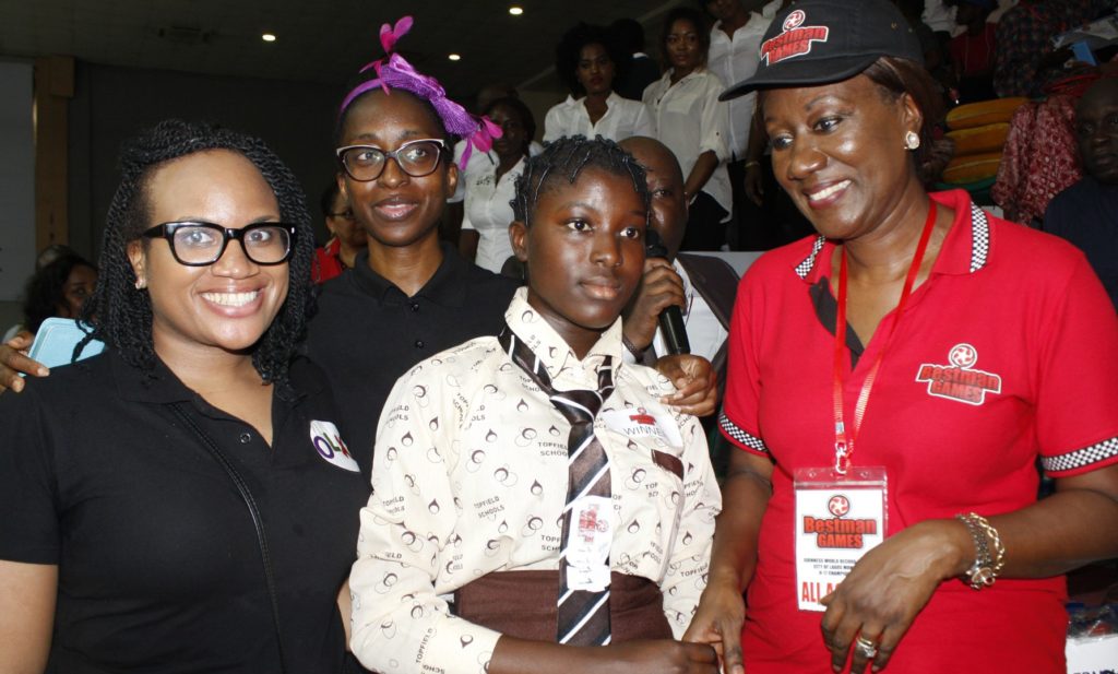 Nimi Akinkugbe, Founder/CEO. Bestman Game Ltd; Elizabeth Braimoh, winner and student of Topfield College, Apapa; Fifemayo Aiyesimoju, Brand Marketing Manager and Uche Nwagboso, Public Relations and Communication, OLX, during the presentation of prizes to the winners of Lagos Monopoly Under 17 Championship at the Teslim Balogun Stadium, Surulere in Lagos. 