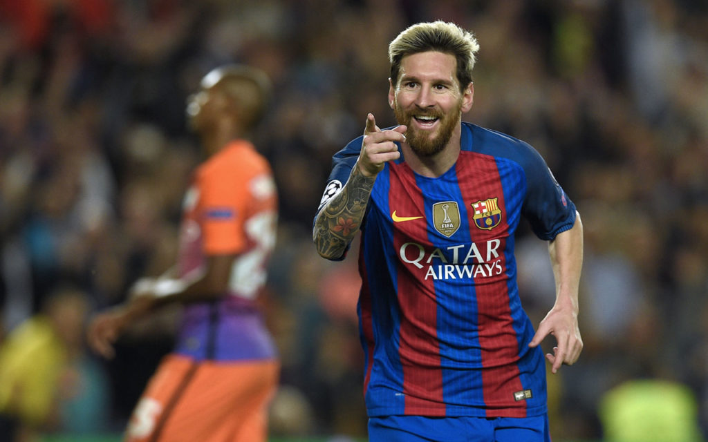 Barcelona's Argentinian forward Lionel Messi celebrates a goal during the UEFA Champions League football match FC Barcelona vs Manchester City at the Camp Nou stadium in Barcelona on October 19, 2016. / AFP PHOTO / LLUIS GENE