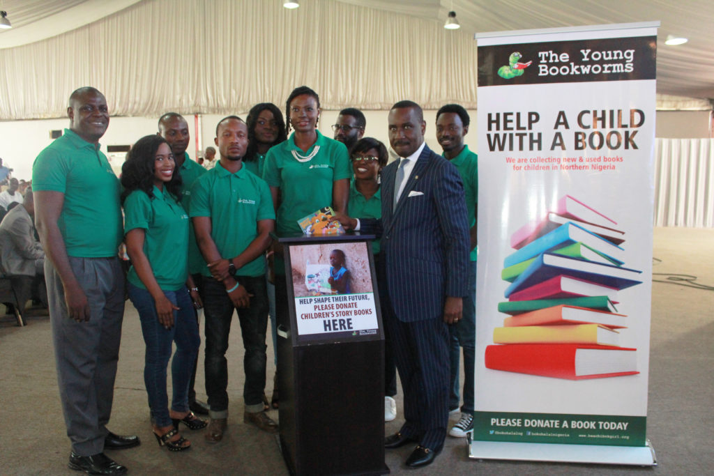 Donate A Book For A Child: Senior Pastor, Trinity House, Pastor Itua Ighodalo(right in suit) in a group picture with volunteers of Young African Bookworms (Non-Government Organisation) has he flagged-off a one-month initiative aim to raise reading books for less privileged children in the society, yesterday in Lagos.