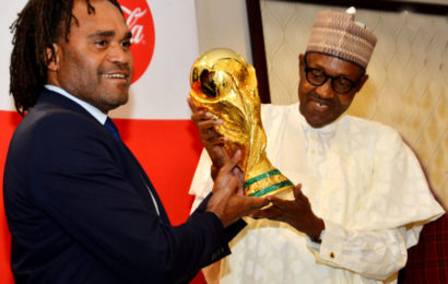 Updated (Video) Buhari Receives FIFA World Cup in Abuja