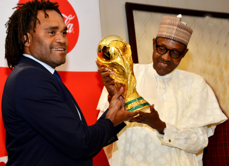 Updated (Video) Buhari Receives FIFA World Cup in Abuja