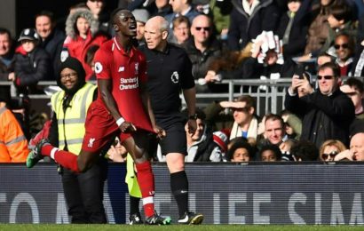 Liverpool survive scare to return to top of Premier League